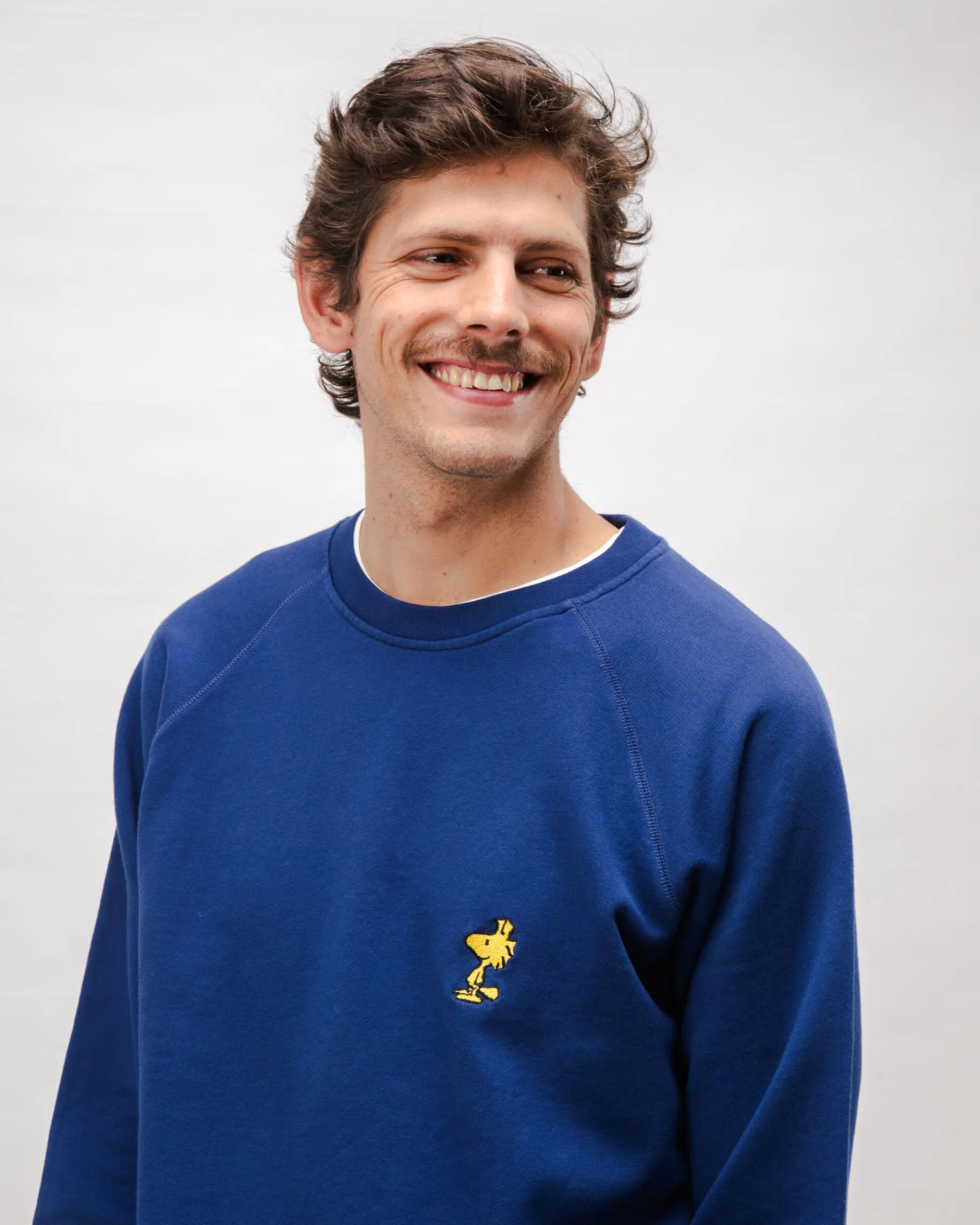 peanuts_woodstock_baumwollsweatshirt_marine_3.webp Peanuts Woodstock Baumwoll-Sweatshirt Marine-Brava Fabrics Fashion